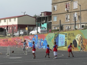 Children from Hout Bay are kept off the streets with soccer, in the Stars in their Eyes project.